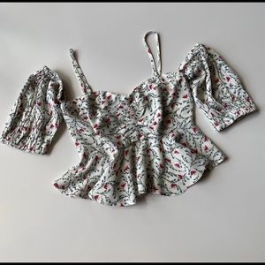 BEBE Off Shoulder Floral peplum style crop top